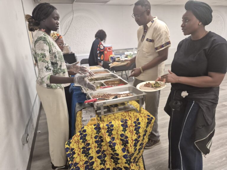 Guests serving themselves from warming trays at the BCCEEP Centre